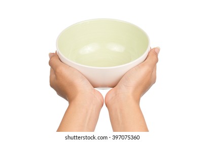 Hand holding an empty bowl isolated on white background
