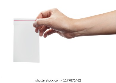 Hand Holding Empty Plastic Ziplock Bag, Isolated On White Background