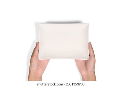 Hand Holding Empty White Square Plate Isolated On White Background. Top  View