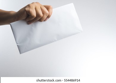 Hand Holding Envelope On White Background