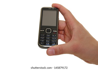 A Hand Holding A Feature Phone