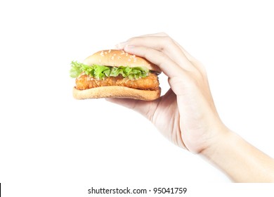 Hand  holding  a fish burger on white  background
