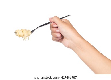 Hand holding fork, eating pasta spaghetti isolated on white background