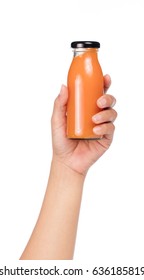 Hand Holding Fresh Of Juice Orange Bottle Isolated On White Background.