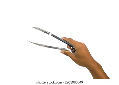 Hand Holding Fried Tongs. Isolated White Background