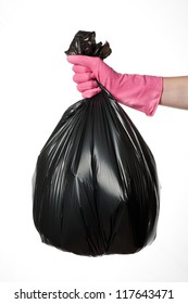 Hand Holding A Full Black Plastic Trash Bag