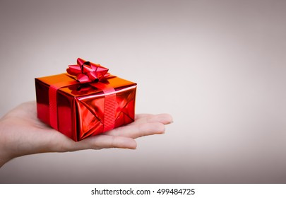 Hand Holding Gift. 