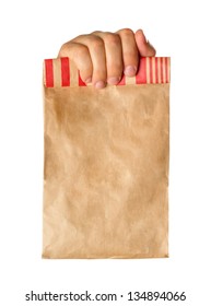 Hand Holding Or Giving A Brown Paper Bag