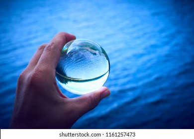 Hand Holding Glass Ball Reflecting Lake Stock Photo 1161257473 ...