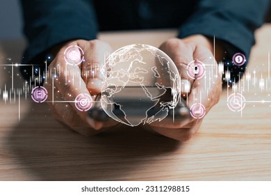 hand holding global and graph stock to plan in e-business, the use of online digital network technology in business, buying and selling commerce online digital marketplace - Shutterstock ID 2311298815