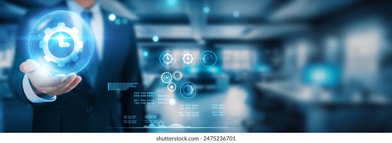 "Hand holding global network connection on screens, tablets, smartphones, laptops, and smartwatches, exemplifying time management through technology and futuristic connectivity.  - Powered by Shutterstock