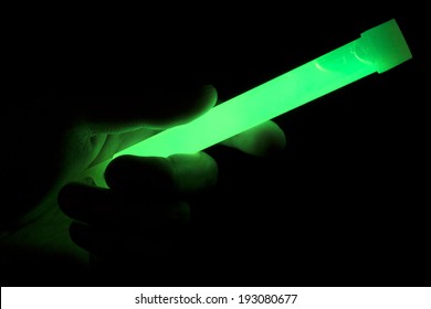 A Hand Holding Glow Stick