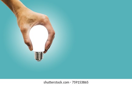 hand holding glowing polygonal lamp on background blue. Innovative ideas concept. Bright idea. the way to solve problem. business.Creative thinking Bright Ideas for Business Finance Solutions. - Shutterstock ID 759153865