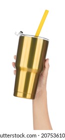 Hand Holding Gold Yeti Cup With Tube Isolated On White Background.