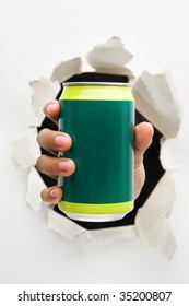 Hand holding green can mean breakthrough in drinking innovation - one of the breakthrough series
