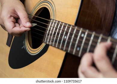 wooden guitar chord player