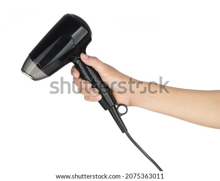 Hand holding Hair Dryer isolated on white background