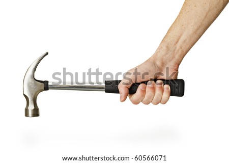 The hand holding the hammer isolated on a white background