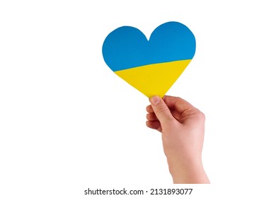 Hand holding a heart made from the flag of Ukraine blue yellow on an isolated white background. Concept of victory of Ukraine, independence of Ukraine. Patriotism and love for the country. My homeland