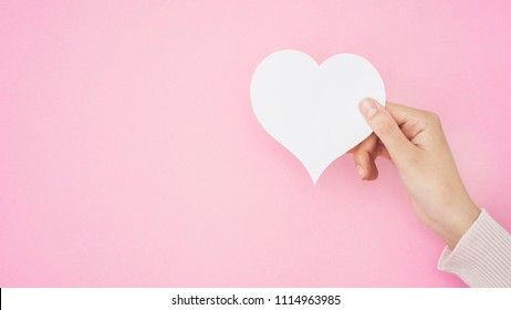 Hand Holding Heart Shape Card