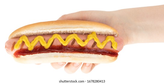 Hand Holding Hot Dog With Mustard Isolated On White Background. Ð¡lipping Path.