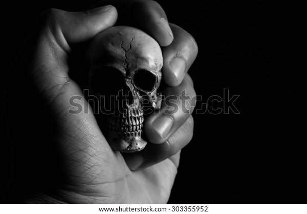 Hand Holding Human Skull On Low Stock Photo 303355952 Shutterstock