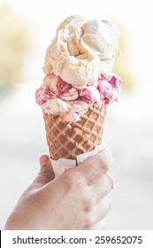 Hand Holding An Ice Cream Cone