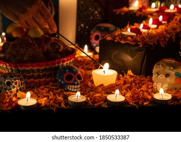 Hand Holding Incense Stick Over 