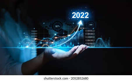 Hand Holding Increase Arrow Graph Corporate Future Growth In Year 2022. New Goals, Plans And Visions For Next Year 2022. Planning,opportunity, Challenge And Business Strategy. 