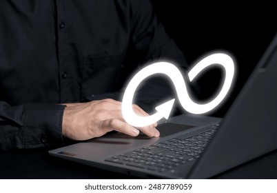 Hand holding infinity sign symbol for circular economy and business growth unlimited by , future together sustainable development business and environment concept.