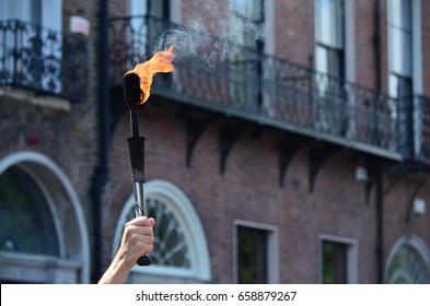 Hand Holding A Juggling Fire Torch