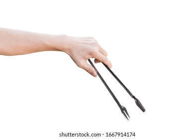 Hand holding kitchen tongs isolated on white background with clipping path.