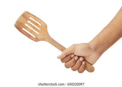 Hand Holding Kitchen Wood Spatula Isolated On White Background.