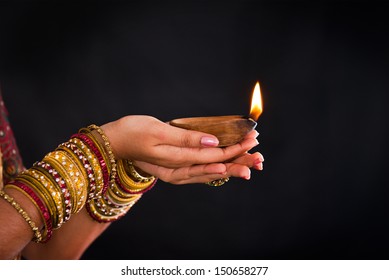 1,374 Hand Holding Diya Images, Stock Photos & Vectors | Shutterstock