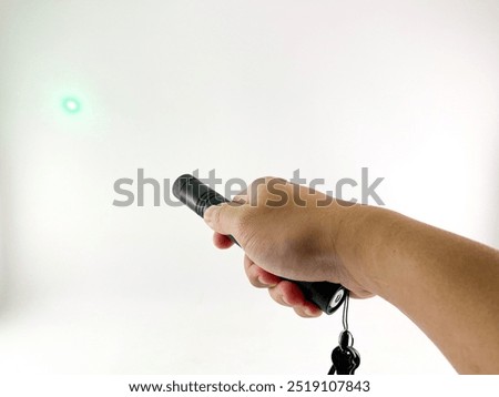 hand holding Laser pointer on white background
