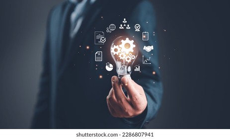 Hand holding Light bulb, Global Internet connection cloud computing. Business global internet connection application technology, digital marketing, Financial and banking, Digital link tech, big data. - Powered by Shutterstock