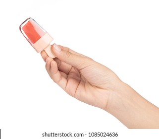 Hand Holding Lipstick And Cheek Tint In Ice Cream Bottle So Cute Isolated On White Background