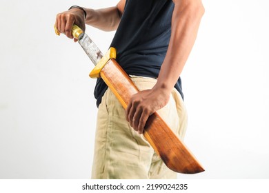 Hand Holding Machete Isolated White.