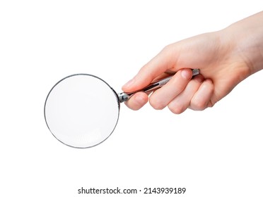 Hand holding magnifying glass isolated on white background. Information search, data analysis and verification concept. Accessory for people with poor eyesight or for spy, detective profession. photo