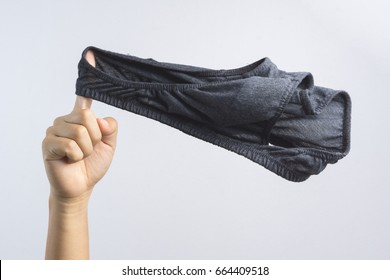 Hand Holding Man Underware Or Underpants For Men On White Background