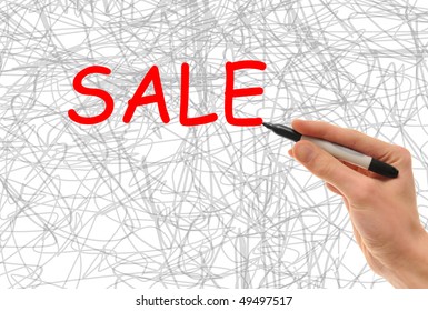 Hand holding a marker writing the word Sale in big letters - Shutterstock ID 49497517