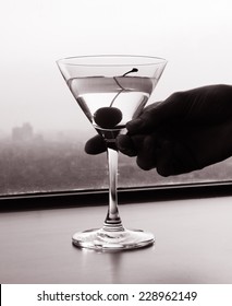 Hand Holding Martini Glass 