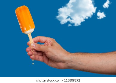 Hand Holding Melting Ice Cream Bar