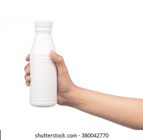 Hand Holding Milk Bottle Isolated On White Background