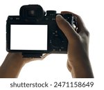 Hand holding Mirrorless camera with white screen isolated on white background, clipping path