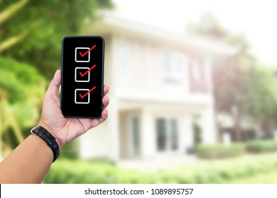 Hand Holding Mobile Phone, Home Inspection 