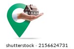 Hand holding a model house and location pin, real estate concept, White background