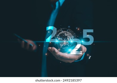 Hand holding the modern and digital globe with 2025 new year on modern background, Digital transformation trend in 2025, Technology trend, business transformation. Preparation for disruptions.