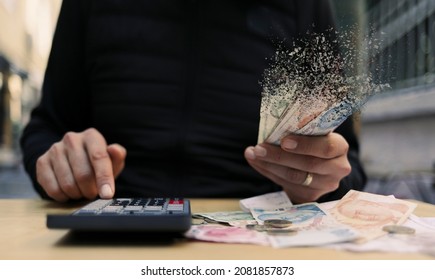 hand holding money. Financial crisis concept. suitable for money, economy, finance and bank themes. - Shutterstock ID 2081857873
