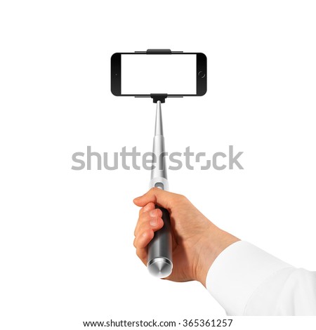 Hand holding monopod with blank screen phone mock up isolated, take selfie. Empty display smartphone monopod hold in arm. Clear monitor smart phone close-up, making self portrait. Selfi stick holder.